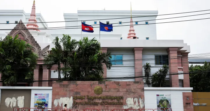 A woman walks past the Royal Embassy of Cambodia, after Thailand recalled its ambassador to Cambodia and said it would expel Cambodia's ambassador, following a landmine incident that injured Thai soldiers and recent clashes along the disputed border between the two countries, in Bangkok, Thailand, July 24, 2025. REUTERS/Chalinee Thirasupa/Chalinee Thirasupa