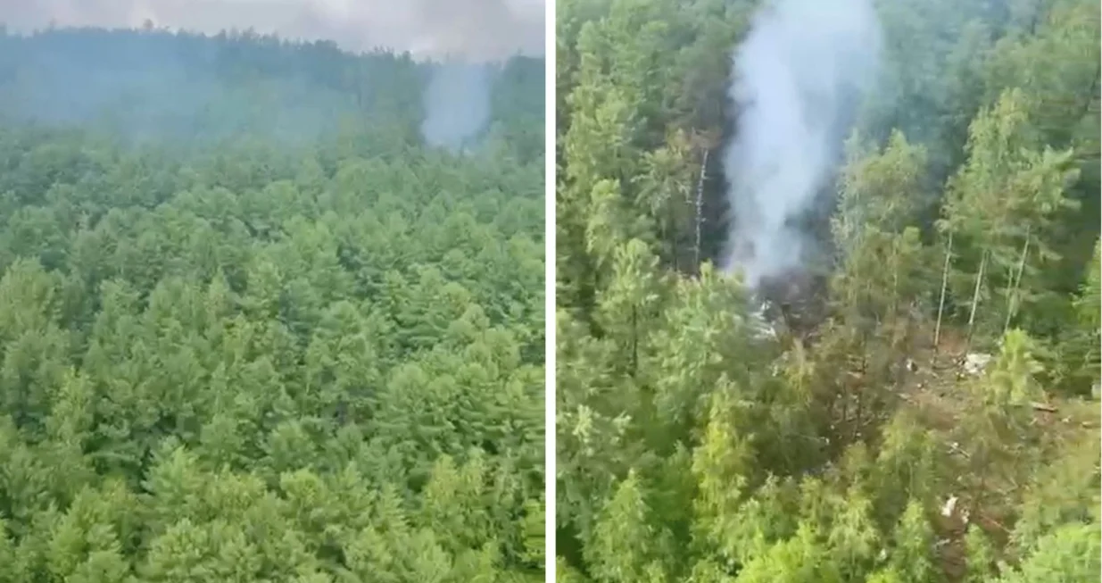 Smoke rises at the crash site of an Angara Airlines An-24 passenger plane near Tynda in the Amur Region, Russia July 24, 2025, in this still image taken from video. Federal Air Transport Agency/Handout via REUTERS ATTENTION EDITORS - THIS IMAGE HAS BEEN SUPPLIED BY A THIRD PARTY. NO RESALES. NO ARCHIVES. MANDATORY CREDIT./Federal Air Transport Agency