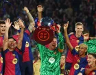 Soccer Football - LaLiga - FC Barcelona v Villarreal - Estadi Olimpic Lluis Companys, Barcelona, Spain - May 18, 2025 FC Barcelona's Marc-Andre ter Stegen lifts the trophy with teammates after winning LaLiga REUTERS/Albert Gea