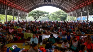 People rest inside a temporary shelter in Srisaket province, after Thailand and Cambodia exchanged heavy artillery fire for a second day on Friday as border fighting intensified and spread, while Cambodia's leader said Thailand had agreed to a Malaysian ceasefire proposal but then backed down, Thailand, July 26, 2025. REUTERS/Athit Perawongmetha/Athit Perawongmetha