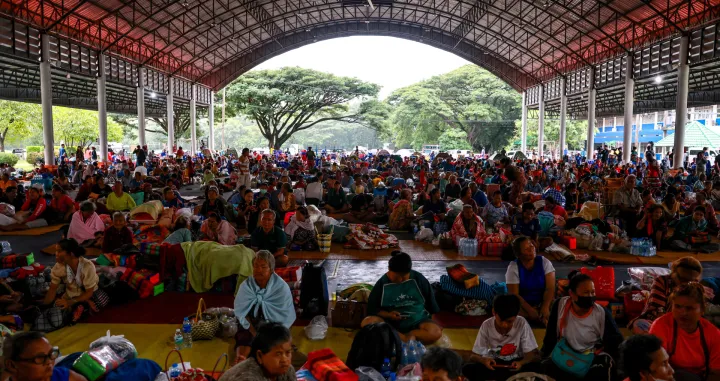 People rest inside a temporary shelter in Srisaket province, after Thailand and Cambodia exchanged heavy artillery fire for a second day on Friday as border fighting intensified and spread, while Cambodia's leader said Thailand had agreed to a Malaysian ceasefire proposal but then backed down, Thailand, July 26, 2025. REUTERS/Athit Perawongmetha/Athit Perawongmetha
