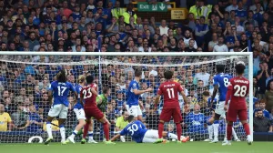 epa10156930 Luis Diaz (3-L) of Liverpool FC hits the goalpost during the English Premier League soccer match between Everton FC and Liverpool FC in Liverpool, Britain, 03 September 2022. EPA/PETER POWELL EDITORIAL USE ONLY. No use with unauthorized audio, video, data, fixture lists, club/league logos or 'live' services. Online in-match use limited to 120 images, no video emulation. No use in betting, games or single club/league/player publications