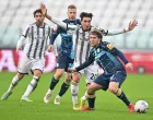 epa10376421 Juventus' Nicolo Fagioli (2-R) and Rijeka's Alen Halilovic (R) in action during the friendly soccer match between Juventus FC and HNK Rijeka at the Allianz Stadium in Turin, Italy, 22 December 2022. EPA/Alessandro Di Marco
