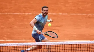 Tennis - French Open - Roland Garros, Paris, France - May 28, 2025 Bosnia's Damir Dzumhur in action during his second round match against France's Giovanni Mpetshi Perricard REUTERS/Lisi Niesner