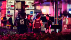 FBI agents and NYPD officers work near the scene of a reported shooter situation in the Manhattan borough of New York City, U.S. July 28, 2025. REUTERS/Eduardo Munoz/Eduardo Munoz