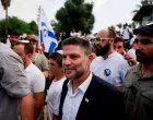 FILE PHOTO: Israeli Finance Minister Bezalel Smotrich walks to visit the Damascus Gate to Jerusalem's Old City, as Israelis mark Jerusalem Day, in Jerusalem May 26, 2025. REUTERS/Ammar Awad/File Photo/Ammar Awad