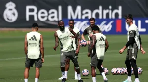 Soccer Football - Club World Cup - Real Madrid Training - Gardens North Country District Park, Palm Beach Gardens, Florida, U.S. - June 15, 2025 Real Madrid's Antonio Rudiger, Rodrygo and Thibaut Courtois during training REUTERS/Hannah Mckay