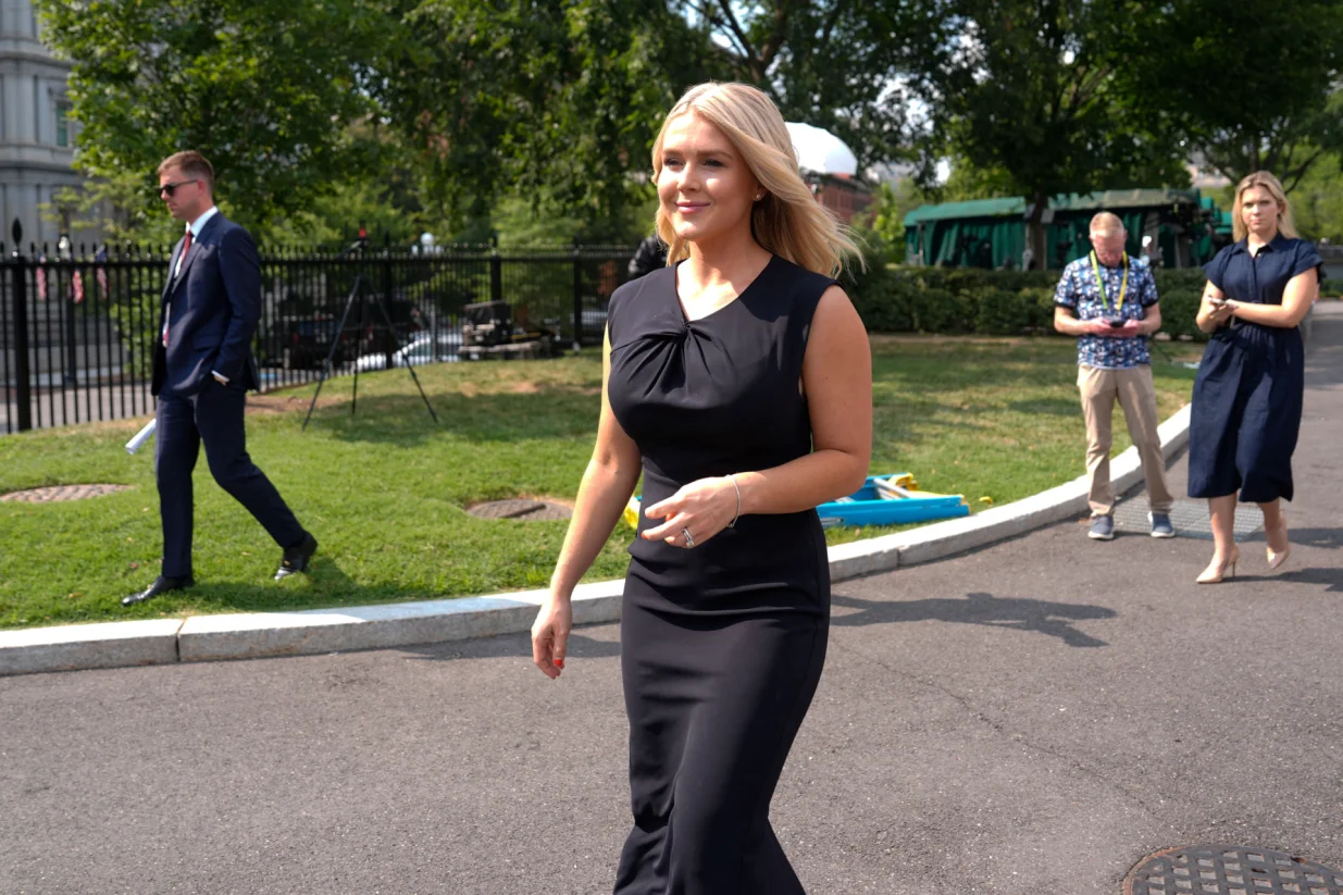 White House Press Secretary Karoline Leavitt smiles to members of the press at the White House in Washington, D.C., U.S., July 22, 2025. REUTERS/Kent Nishimura/Kent Nishimura