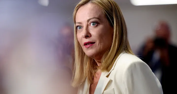 FILE PHOTO: Italian Prime Minister Giorgia Meloni reacts as she speaks to the media at a NATO summit in The Hague, Netherlands June 25, 2025. REUTERS/Claudia Greco/File Photo/Claudia Greco