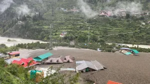 Houses are partially buried by a mudslide, amid flash floods, in Dharali, Uttarakhand, India, August 5, 2025. Indian Army Central Command via X/Handout via REUTERS THIS IMAGE HAS BEEN SUPPLIED BY A THIRD PARTY. MANDATORY CREDIT. TPX IMAGES OF THE DAY  VERIFICATION Reuters was able to confirm the location by buildings and terrain which matched file and satellite imagery. The date was verified by official and local media reports of flash flood in the area on Tuesday (August 5)./Indian Army Central Command Via