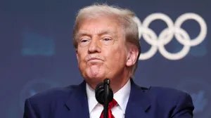 U.S. President Donald Trump reacts after signing an executive order to create a White House Olympics task force to handle security and other issues related to the LA 2028 summer Olympics in the South Court Auditorium on the White House campus in Washington, D.C., U.S., August 5, 2025. REUTERS/Jonathan Ernst/Jonathan Ernst