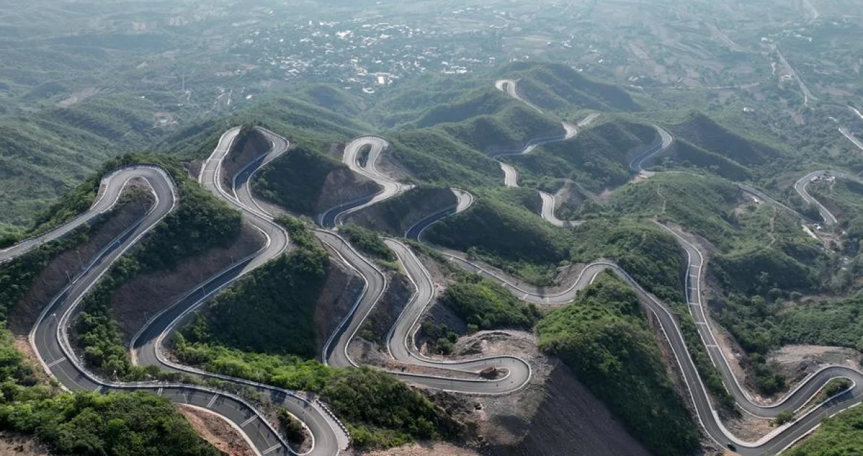 (241129) -- BEIJING, Nov. 29, 2024 (Xinhua) -- An aerial drone photo taken on May 9, 2024 shows a rural road after upgrade in Yuanshi County, Shijiazhuang City, north China's Hebei Province. (Xinhua/Yang Shiyao)/Yang Shiyao