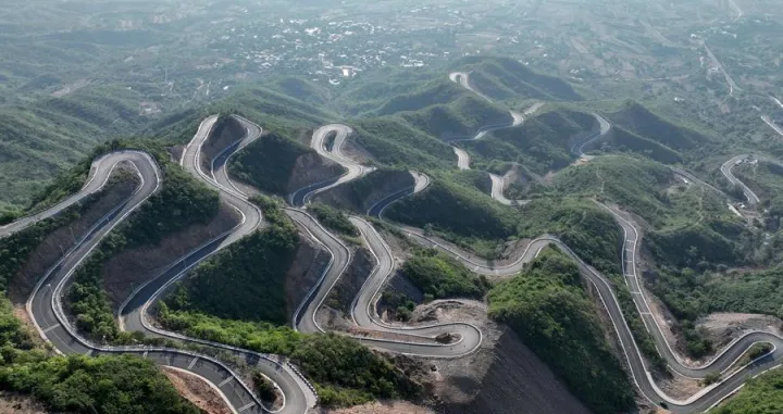 (241129) -- BEIJING, Nov. 29, 2024 (Xinhua) -- An aerial drone photo taken on May 9, 2024 shows a rural road after upgrade in Yuanshi County, Shijiazhuang City, north China's Hebei Province. (Xinhua/Yang Shiyao)/Yang Shiyao