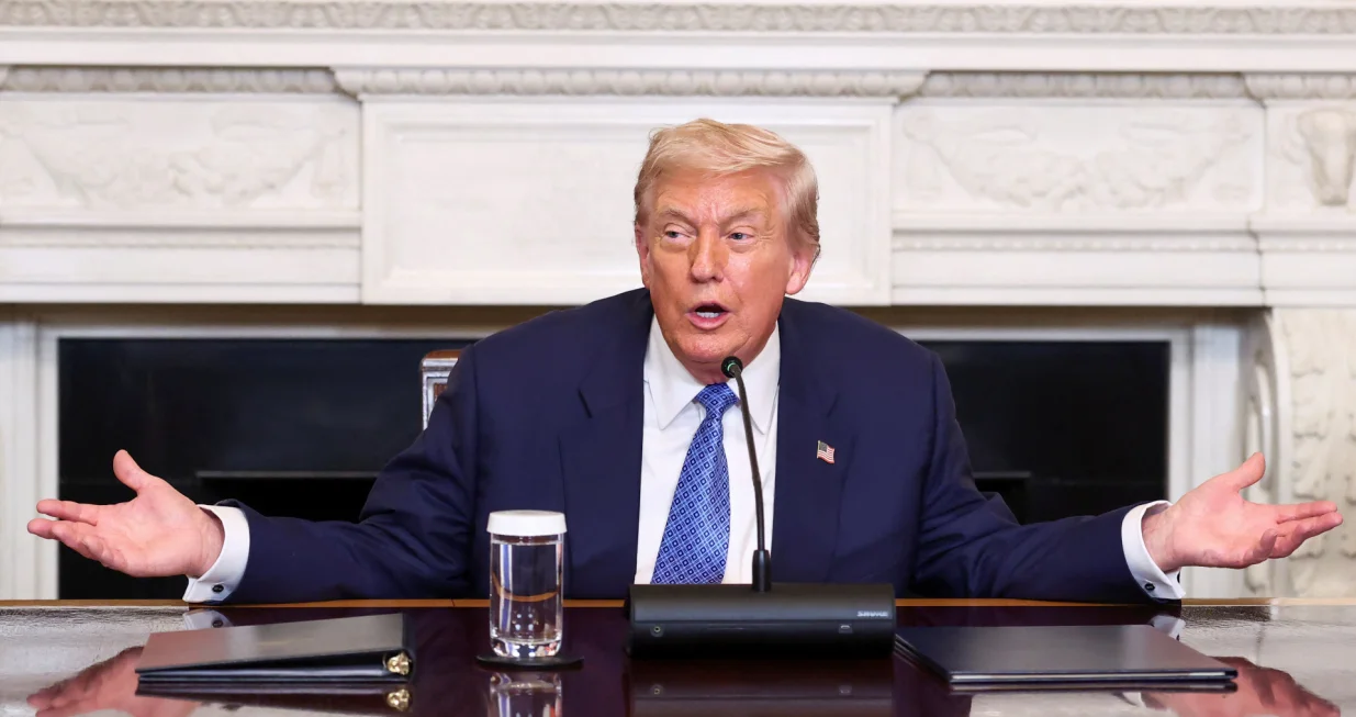 U.S. President Donald Trump gestures during a trilateral signing event with Armenia's Prime Minister Nikol Pashinyan and Azerbaijan's President Ilham Aliyev (not pictured), at the White House, in Washington, D.C., August 8, 2025. REUTERS/Kevin Lamarque/Kevin Lamarque