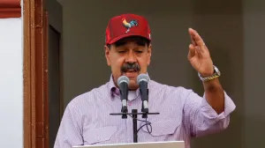 Venezuelan President Nicolas Maduro addresses supporters during a march marking the first anniversary of his victory in the disputed July 28 presidential election, in Caracas, Venezuela July 28, 2025. REUTERS/Leonardo Fernandez Viloria/Leonardo Fernandez Viloria