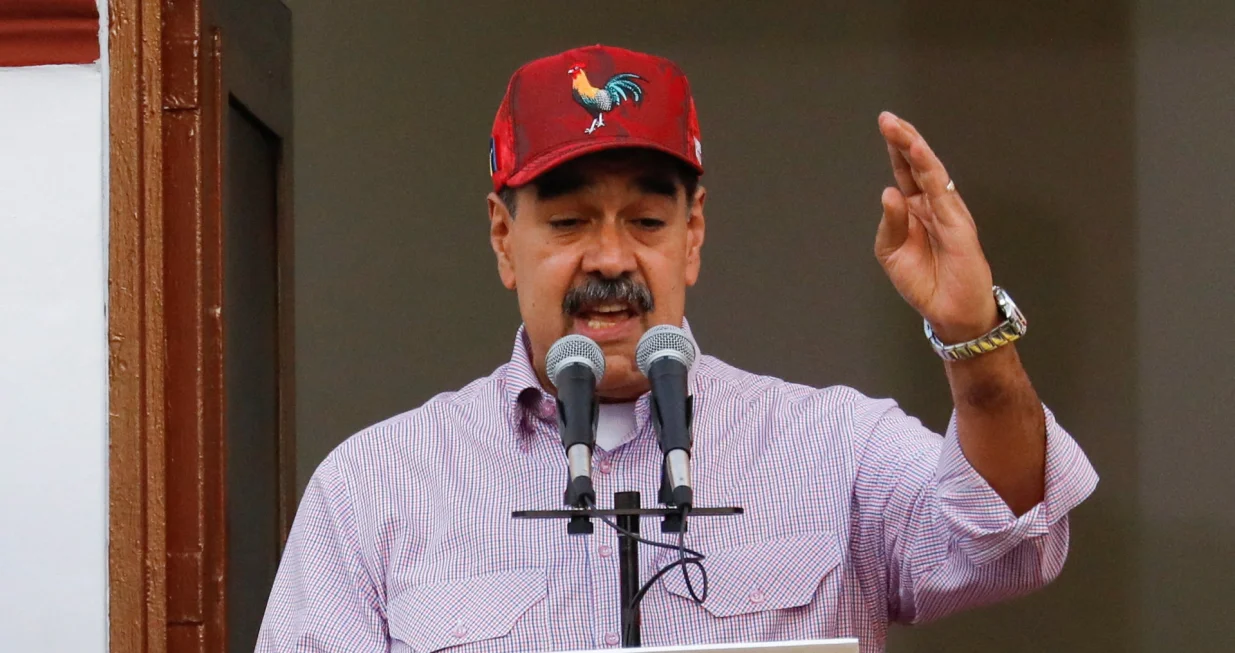 Venezuelan President Nicolas Maduro addresses supporters during a march marking the first anniversary of his victory in the disputed July 28 presidential election, in Caracas, Venezuela July 28, 2025. REUTERS/Leonardo Fernandez Viloria/Leonardo Fernandez Viloria