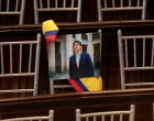 FILE PHOTO: A picture of Colombian Senator Miguel Uribe Turbay of the opposition Democratic Center party hangs from a chair during the opening of the new session of the Colombian Congress, in Bogota, Colombia, July 20, 2025. REUTERS/Luisa Gonzalez/File Photo/Luisa Gonzalez