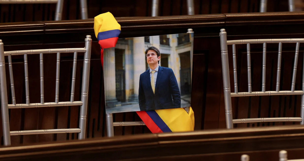 FILE PHOTO: A picture of Colombian Senator Miguel Uribe Turbay of the opposition Democratic Center party hangs from a chair during the opening of the new session of the Colombian Congress, in Bogota, Colombia, July 20, 2025. REUTERS/Luisa Gonzalez/File Photo/Luisa Gonzalez