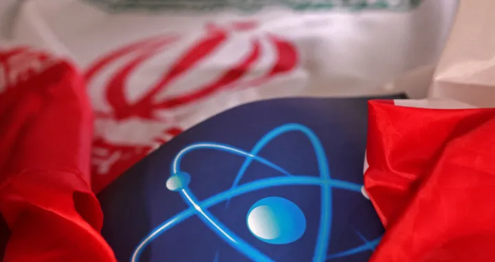 FILE PHOTO: Atomic symbol and Iranian flag are seen in this illustration taken September 8, 2022. REUTERS/Dado Ruvic/Illustration/File Photo/File Photo/Dado Ruvic