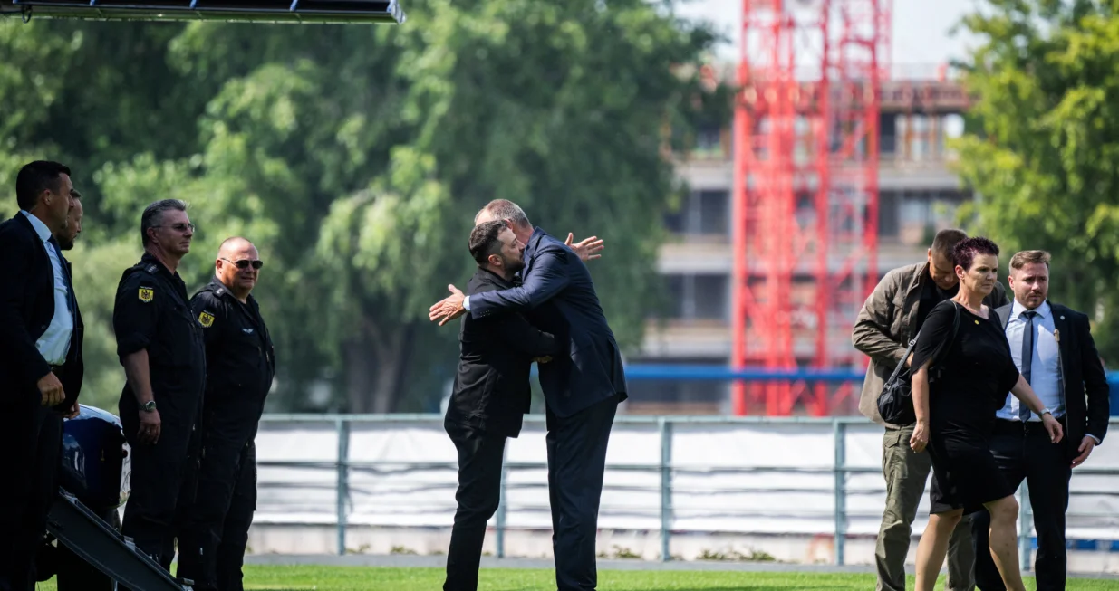 German Chancellor Friedrich Merz welcomes Ukrainian President Volodymyr Zelenskiy upon his arrival in the garden of the chancellery in Berlin to join a video conference of European leaders with the US President on the Ukraine war ahead of the summit between the US and Russian leaders, on August 13, 2025. European leaders will hold online talks with US President Donald Trump, hoping to convince him to respect Ukraine's interests when he discusses the war with Putin in Alaska on Friday. JOHN MACDOUGALL/Pool via REUTERS/John Macdougall