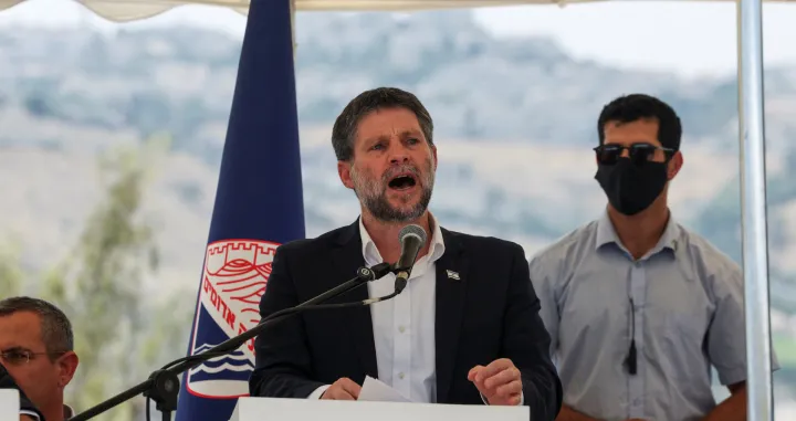 Israeli Finance Minister Bezalel Smotrich speaks at a press conference regarding settlements expansion for the long-frozen E1 settlement, that would split East Jerusalem from the occupied West Bank, near the Israeli settlement of Maale Adumim in the Israeli-occupied West Bank, August 14, 2025. REUTERS/Ronen Zvulun/Ronen Zvulun
