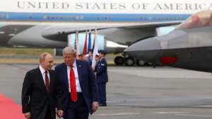 Russian President Vladimir Putin and U.S. President Donald Trump walk on the tarmac after they arrived to attend a meeting at Joint Base Elmendorf-Richardson in Anchorage, Alaska, U.S., August 15, 2025. Sputnik/Gavriil Grigorov/Pool via REUTERS ATTENTION EDITORS - THIS IMAGE WAS PROVIDED BY A THIRD PARTY./Gavriil Grigorov