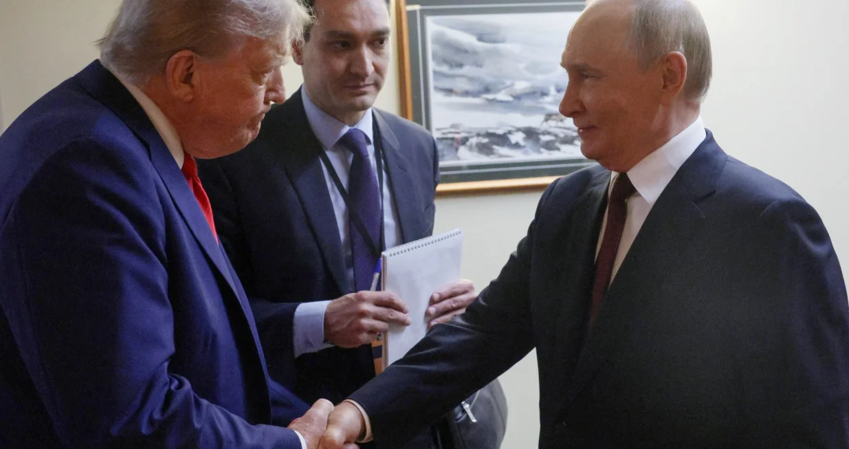 U.S. President Donald Trump shakes hands with Russian President Vladimir Putin before a joint news conference following their meeting at Joint Base Elmendorf-Richardson in Anchorage, Alaska, U.S., August 15, 2025. Sputnik/Gavriil Grigorov/Pool via REUTERS ATTENTION EDITORS - THIS IMAGE WAS PROVIDED BY A THIRD PARTY./Gavriil Grigorov