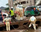 Emergency workers search for bodies while clearing debris following a deadly flood due to heavy rains, in Conakry, Guinea August 2, 2025. REUTERS/Souleymane Camara  TPX IMAGES OF THE DAY/Souleymane Camara