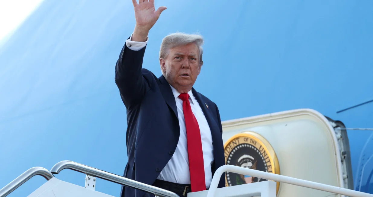 U.S. President Donald Trump boards Air Force One as he departs for Alaska to meet with Russian President Vladimir Putin to negotiate for an end to the war in Ukraine, from Joint Base Andrews in Maryland, U.S., August 15, 2025. REUTERS/Kevin Lamarque/Kevin Lamarque