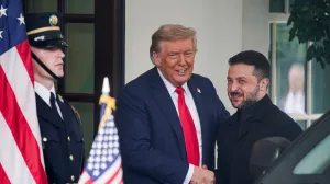 U.S. President Donald Trump greets Ukrainian President Volodymyr Zelenskiy as he arrives at the White House amid negotiations to end the Russian war in Ukraine, in Washington, D.C., U.S., August 18, 2025. REUTERS/Nathan Howard/Nathan Howard