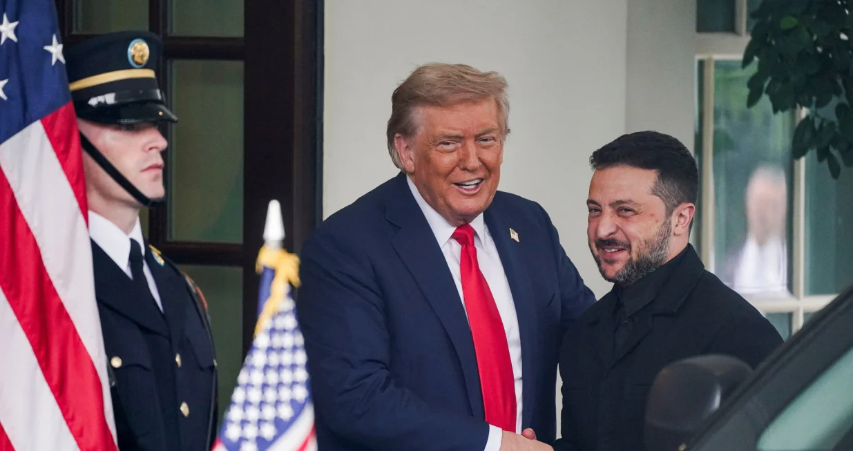 U.S. President Donald Trump greets Ukrainian President Volodymyr Zelenskiy as he arrives at the White House amid negotiations to end the Russian war in Ukraine, in Washington, D.C., U.S., August 18, 2025. REUTERS/Nathan Howard/Nathan Howard