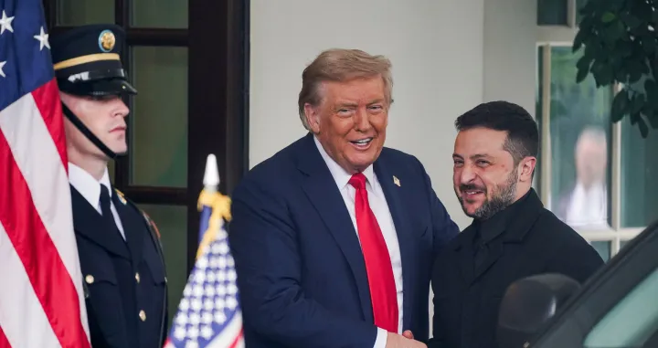 U.S. President Donald Trump greets Ukrainian President Volodymyr Zelenskiy as he arrives at the White House amid negotiations to end the Russian war in Ukraine, in Washington, D.C., U.S., August 18, 2025. REUTERS/Nathan Howard/Nathan Howard
