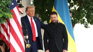 U.S. President Donald Trump greets Ukrainian President Volodymyr Zelenskiy at the White House, amid negotiations to end the Russian war in Ukraine, in Washington, D.C., U.S., August 18, 2025. REUTERS/Kevin Lamarque/Kevin Lamarque