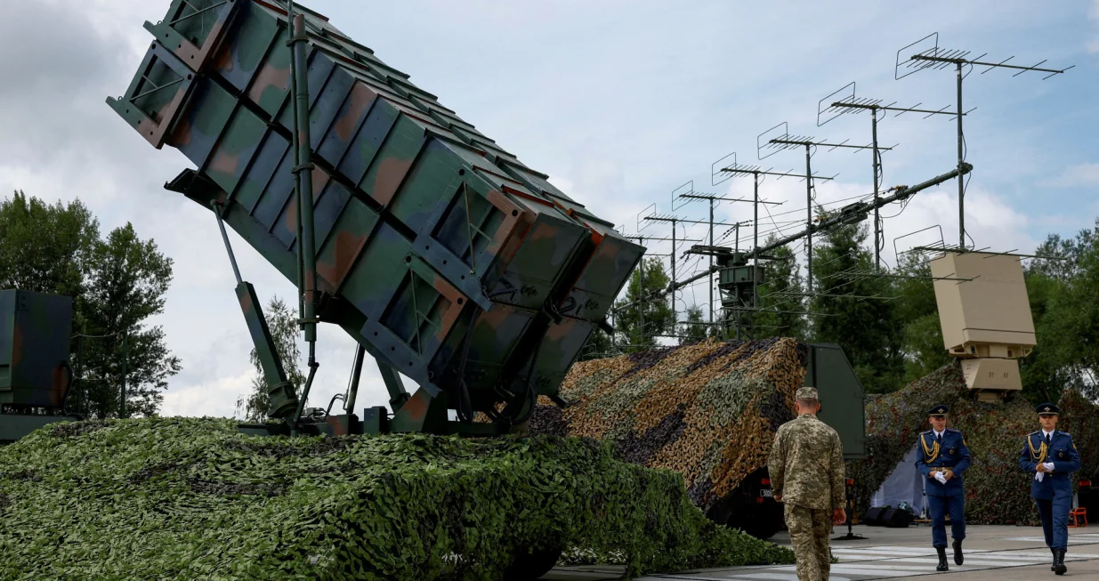 FILE PHOTO: Ukrainian service members walk next to a launcher of a Patriot air defence system, amid Russia's attack on Ukraine, in an undisclosed location, Ukraine August 4, 2024. REUTERS/Valentyn Ogirenko/File Photo/Valentyn Ogirenko