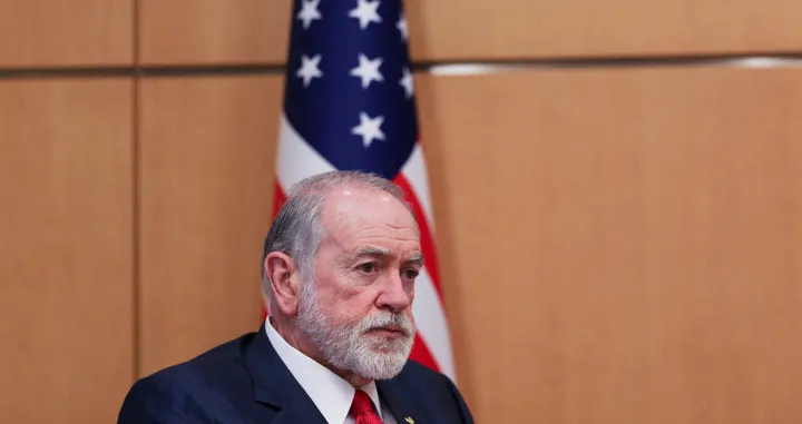 U.S. Ambassador to Israel Mike Huckabee looks on during an interview with Reuters at his office in the U.S. Embassy in Jerusalem, August 8, 2025. REUTERS/Ronen Zvulun/Ronen Zvulun
