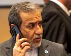 FILE PHOTO: Iranian Foreign Minister Abbas Araghchi makes a phone call during the 51st Session of the Council of Foreign Ministers of the Organisation of Islamic Cooperation (OIC) in Istanbul, Turkey, June 21, 2025. REUTERS/Umit Bektas/File Photo/Umit Bektas