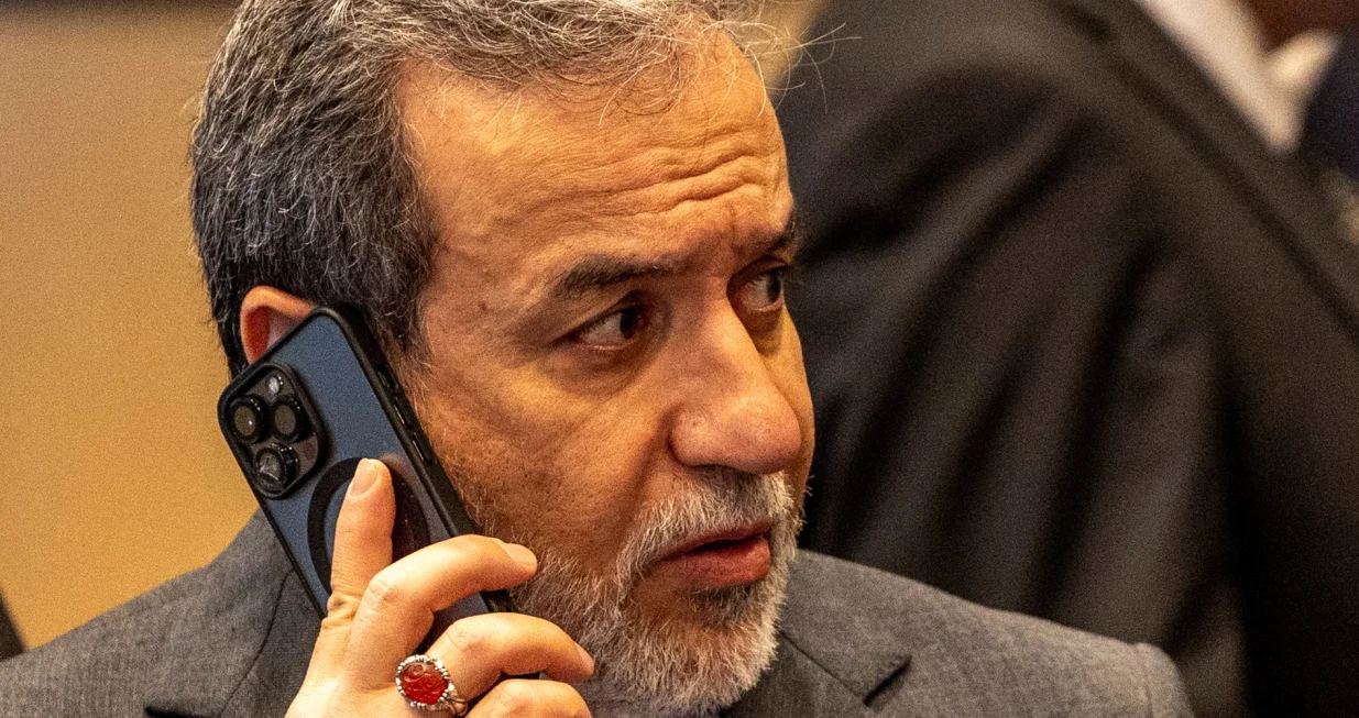 FILE PHOTO: Iranian Foreign Minister Abbas Araghchi makes a phone call during the 51st Session of the Council of Foreign Ministers of the Organisation of Islamic Cooperation (OIC) in Istanbul, Turkey, June 21, 2025. REUTERS/Umit Bektas/File Photo/Umit Bektas