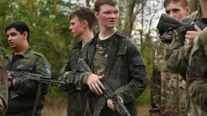 Students of the Don Cossack Cadet School of the Emperor Alexander III and members of the Cossack community undergo military training in the Rostov Region, Russia August 21, 2025. REUTERS/Sergey Pivovarov/Sergey Pivovarov
