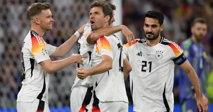 Minhen, Njemačka - 14. jun 2024: Thomas Muller (13) i Ilkay Gundogan (21) iz Njemačke slave u utakmici Evropskog prvenstva u fudbalu 2024. (EURO 2024) Grupe A između Njemačke i &Scaron;kotske na Allianz Areni u Minhenu. (G&ouml;khan Balcı - Anadolu Agency)/Foto: 