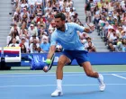Tennis - U.S. Open - Flushing Meadows, New York, United States - August 19, 2025 Serbia's Novak Djokovic in action with Serbia's Olga Danilovic during their round of 16 mixed doubles match against Russia's Mirra Andreeva and Russia's Daniil Medvedev REUTERS/Mike Segar/Foto: Mike Segar