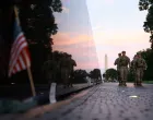 Members of the National Guard walk through the Vietnam Veterans Memorial on the National Mall after U.S. President Donald Trump deployed the National Guard and ordered an increased presence of federal law enforcement to assist in crime prevention, in Washington, D.C., U.S., August 23, 2025. REUTERS/Jose Luis Gonzalez/Jose Luis Gonzalez