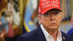 U.S. President Donald Trump wears a 'Trump Was Right About Everything!' hat, as he makes an announcement on the 2026 FIFA World Cup, in the Oval Office at the White House in Washington, D.C., U.S., August 22, 2025. REUTERS/Jonathan Ernst/Jonathan Ernst