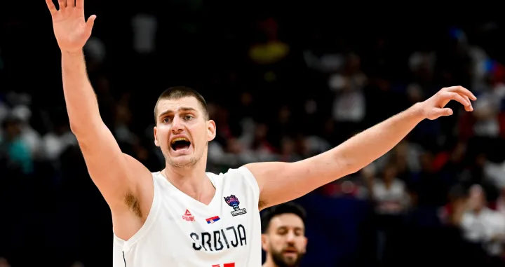 epa10178174 Nikola Jokic of Serbia reacts during the FIBA EuroBasket 2022 round of 16 match between Serbia and Italy at EuroBasket Arena in Berlin, Germany, 11 September 2022. EPA/FILIP SINGER/Foto: Filip Singer
