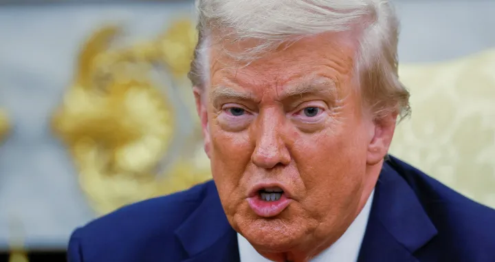 U.S. President Donald Trump attends a meeting with South Korean President Lee Jae Myung (not pictured) at the Oval Office, at the White House, in Washington, D.C., U.S., August 25, 2025. REUTERS/Brian Snyder/Brian Snyder