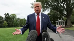 U.S. President Donald Trump speaks to reporters ahed of boarding Marine One to depart for New Jersey, at the White House in Washington, D.C., U.S., August 1, 2025. REUTERS/Jonathan Ernst/Jonathan Ernst