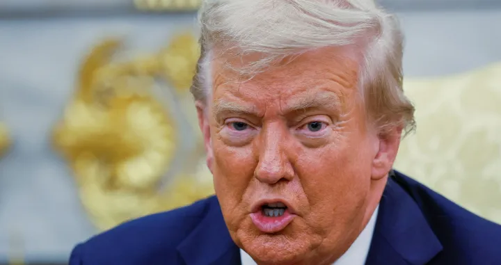U.S. President Donald Trump attends a meeting with South Korean President Lee Jae Myung (not pictured) at the Oval Office, at the White House, in Washington, D.C., U.S., August 25, 2025. REUTERS/Brian Snyder/Brian Snyder