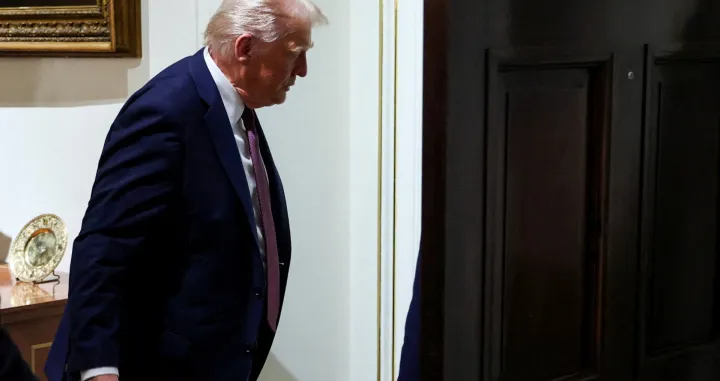 FILE PHOTO: U.S. President Donald Trump leaves, following a cabinet meeting, at the White House in Washington, D.C., U.S., August 26, 2025. REUTERS/Jonathan Ernst/File Photo/Jonathan Ernst