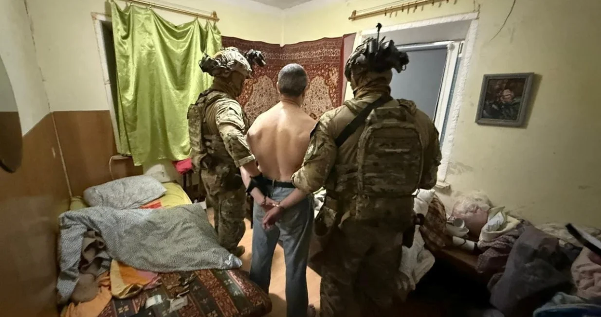 A suspect in the murder of former Ukrainian parliamentary speaker Andriy Parubiy, who was killed on Saturday, is detained by police, amid Russia's attack on Ukraine, in an unknown location in Ukraine, in this handout picture released September 1, 2025. Press service of the National Police of Ukraine/Handout via REUTERS ATTENTION EDITORS - THIS IMAGE HAS BEEN SUPPLIED BY A THIRD PARTY. DO NOT OBSCURE LOGO.  TPX IMAGES OF THE DAY/National Police Of Ukraine