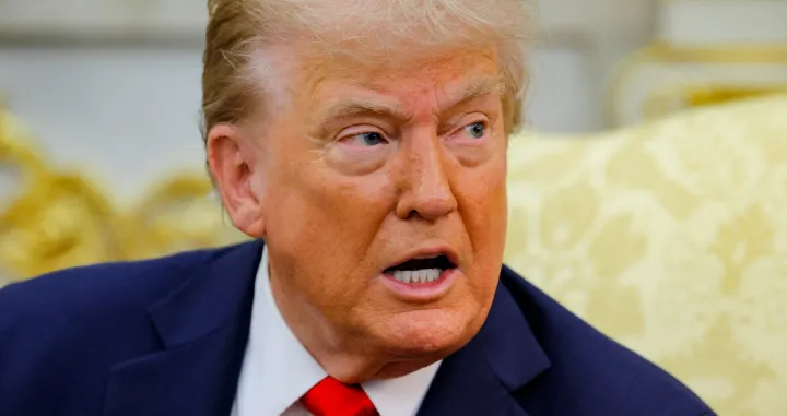 U.S. President Donald Trump reacts as he and the President of Poland Karol Nawrocki (not pictured) meet in the Oval Office at the White House in Washington, D.C., U.S., September 3, 2025. REUTERS/Brian Snyder/Brian Snyder