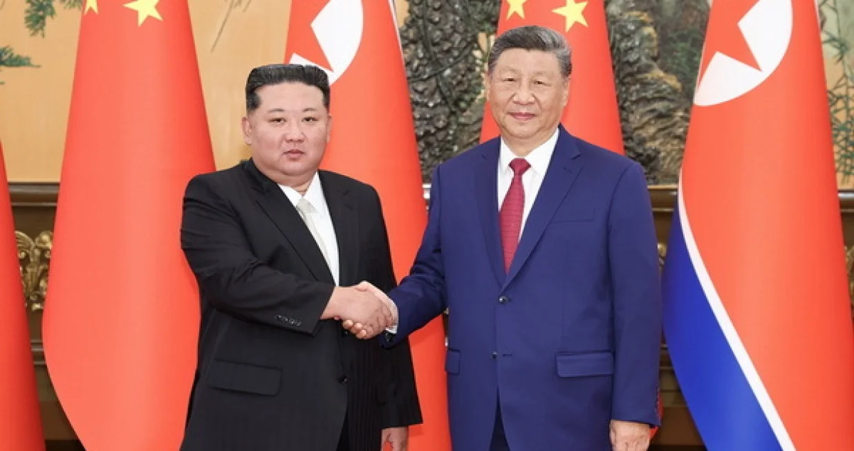 Predsjednik Sjeverne Koreje Kim Jong Un i predsjednik Kine Xi Jinping/
